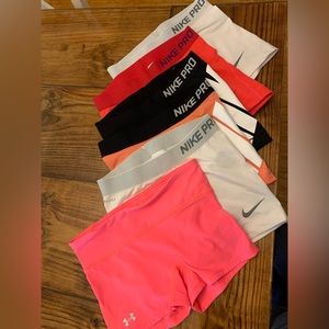 Nike Pro shorts (5 pairs) Under Armour shorts (1 pair)